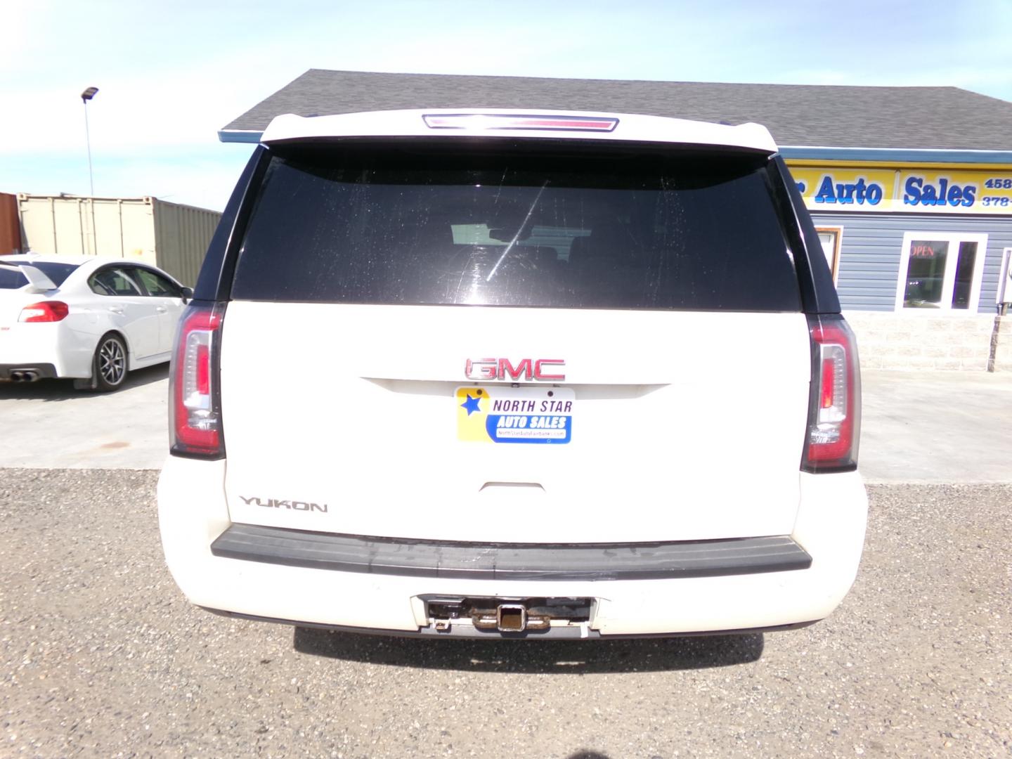 2015 White /Tan GMC Yukon SLT 4WD (1GKS2BKC6FR) with an 5.3L V8 OHV 16V FFV engine, 6-Speed Automatic transmission, located at 2630 Philips Field Rd., Fairbanks, AK, 99709, (907) 458-0593, 64.848068, -147.780609 - Photo#3